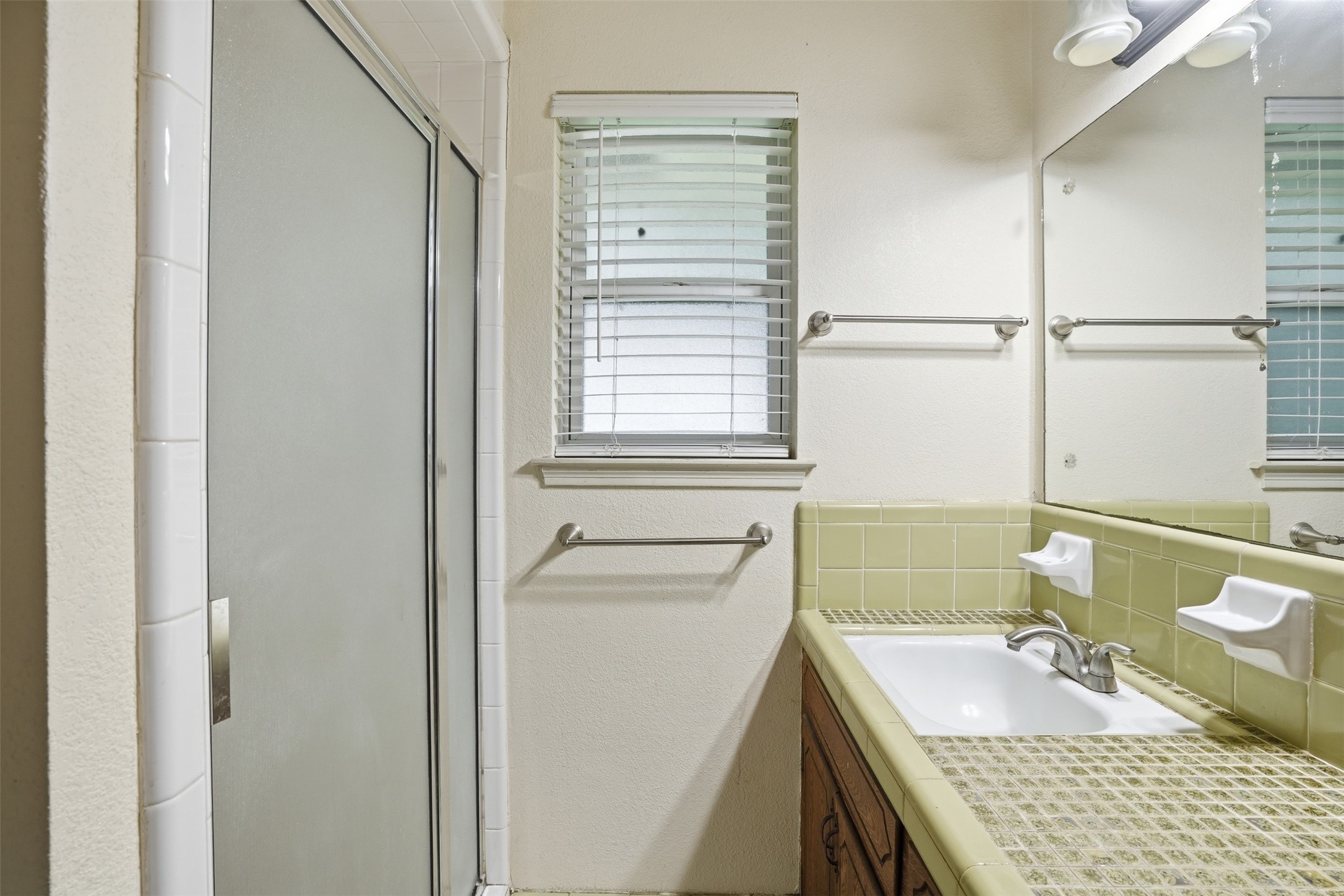 2605 Burke Road Pasadena, TX 77502 - Photo 24 of 29 a bathroom with a granite countertop sink a toilet and tub