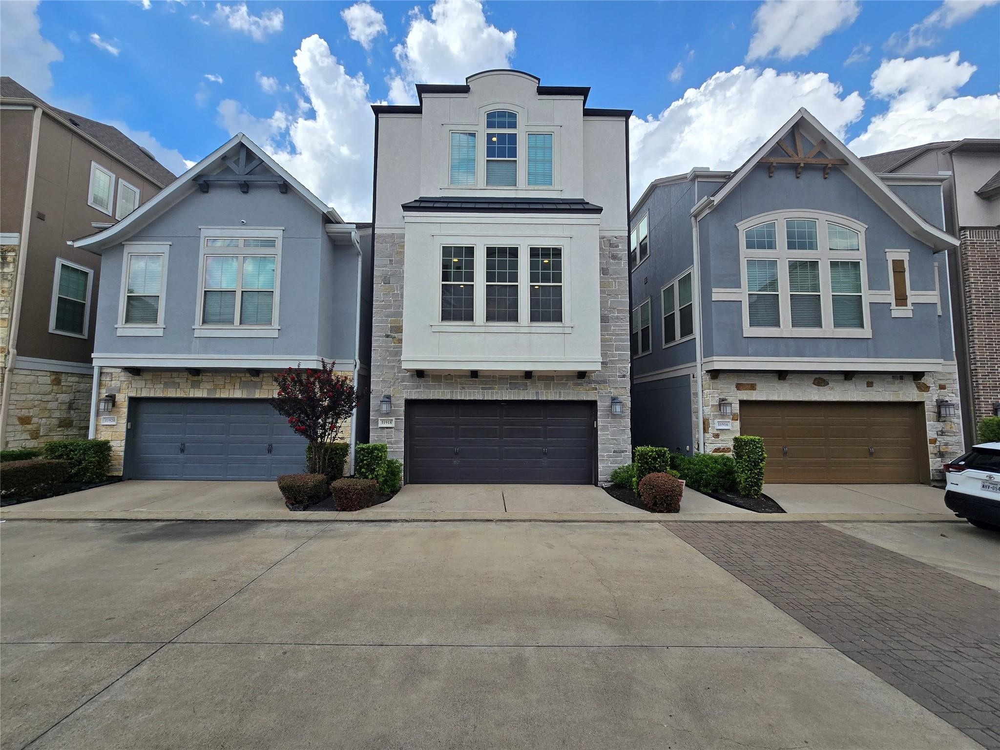 a front view of a house with yard