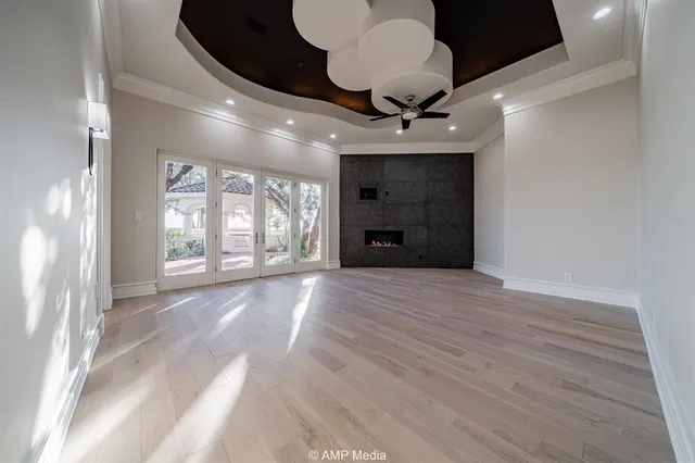 a large hall with a large tub and shower