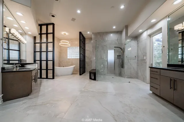 a bathroom with a shower and a sink
