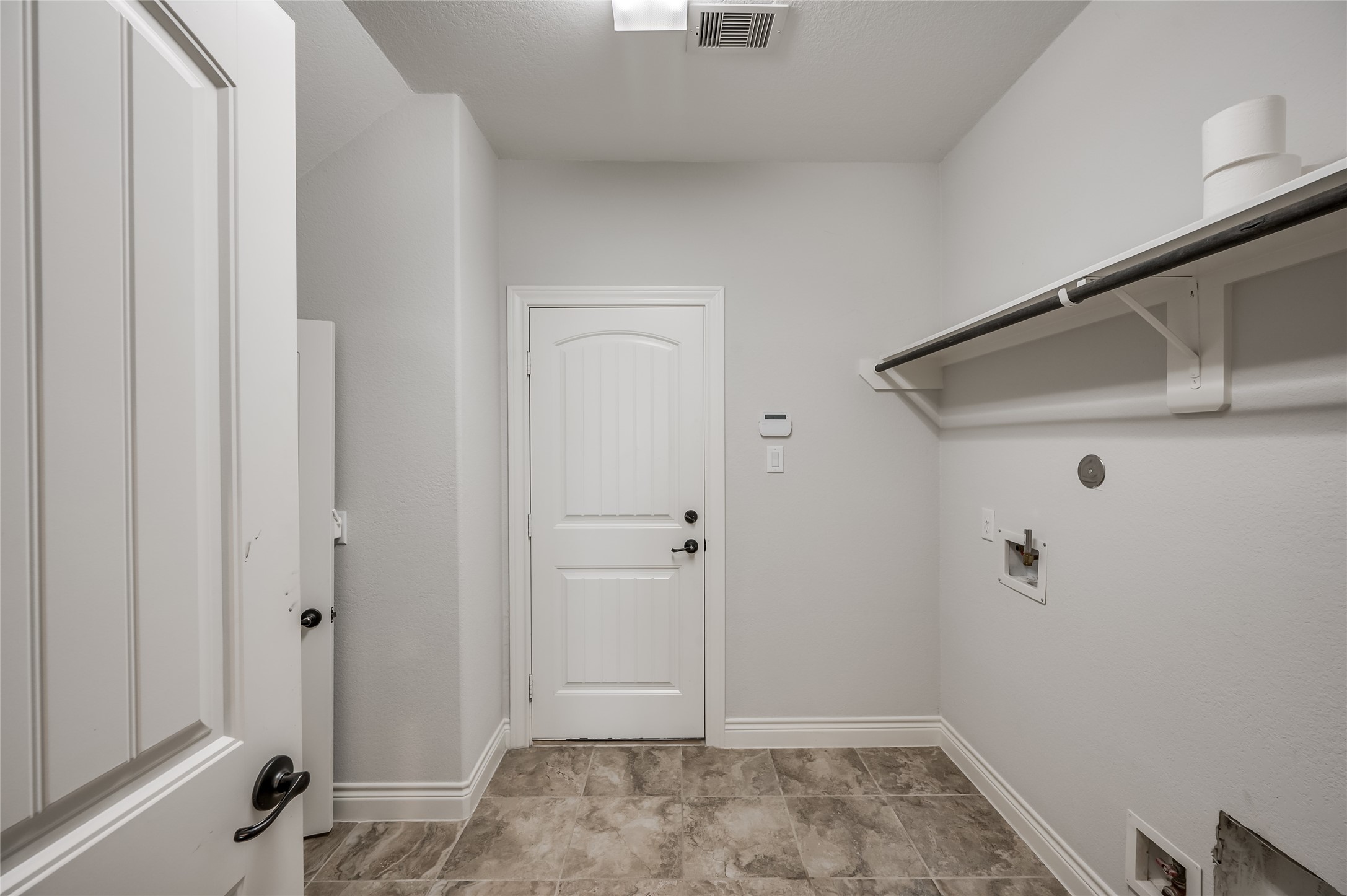 19006 Panther Peak Spring, TX 77388 - Photo 28 of 48 Utility Room with space for washer / Dryer and Extra refirgerator