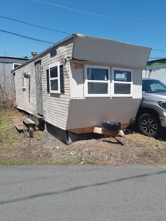 a house view with a backyard space