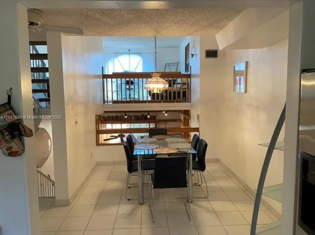 a workspace with furniture and window