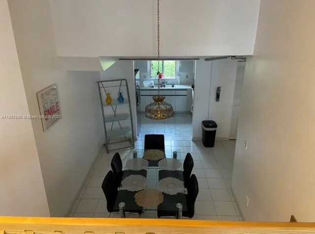 a kitchen with a sink cabinets and window