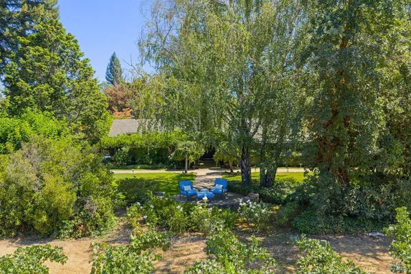 a kitchen with a sink cabinets and window
