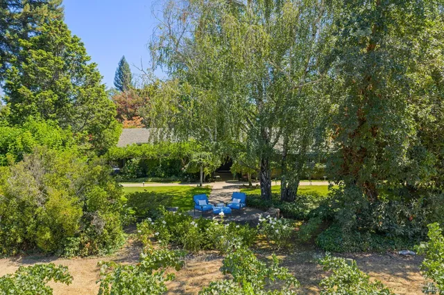 a kitchen with a sink cabinets and window
