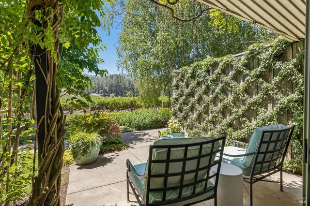 a bathroom with a double vanity sink mirror and shower