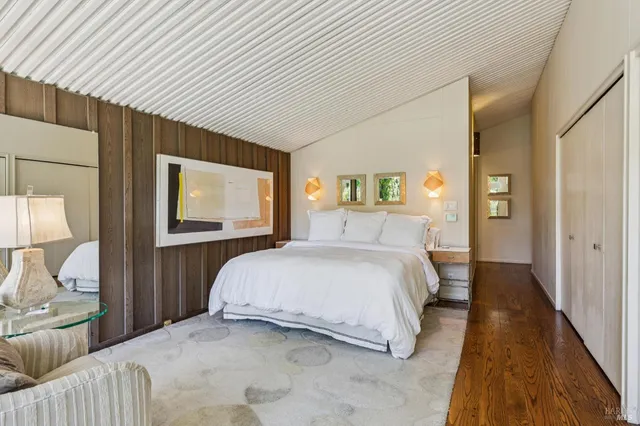 a view of a street with a tree