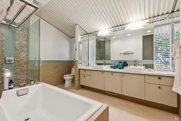 a view of a chairs in a backyard