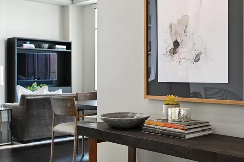 a workspace with furniture and window