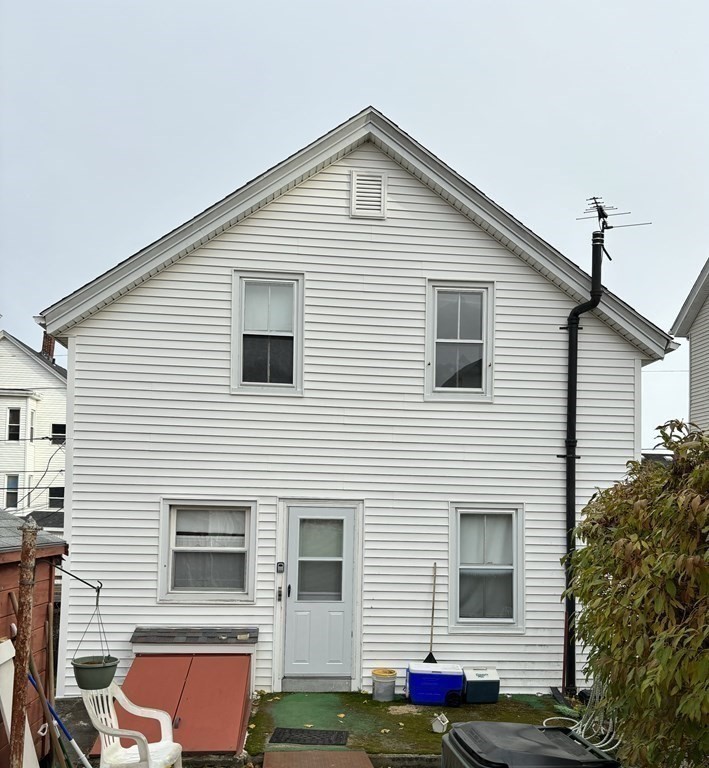 91 Smith Street Fall River, MA 02721 - Photo 2 of 23 a view of the house with a yard