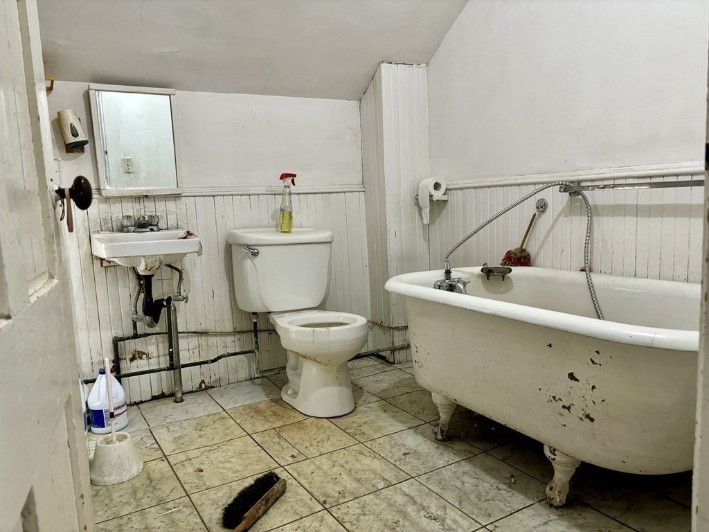 91 Smith Street Fall River, MA 02721 - Photo 21 of 23 a bathroom with a sink toilet and shower
