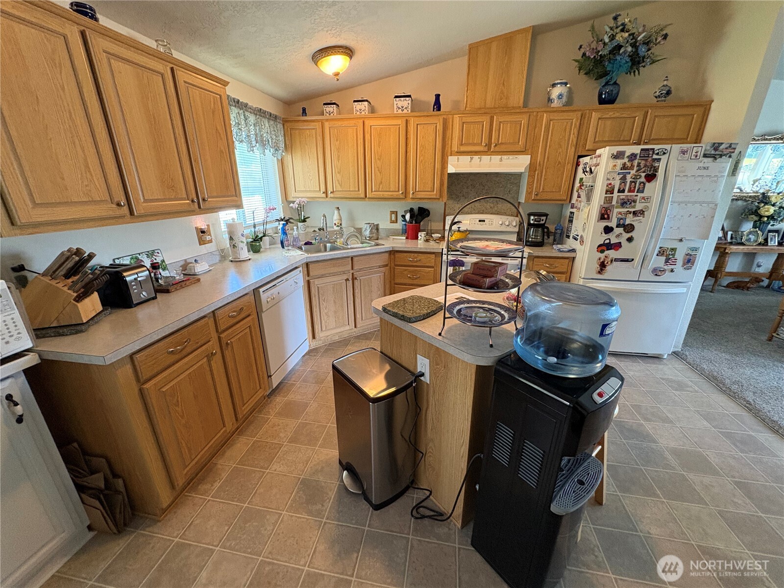 51 Meander Way Aberdeen, WA 98520 - Photo 7 of 22 a kitchen with a sink and cabinets