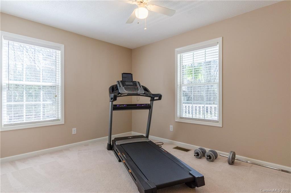 2110 State Rd S-46-168, Unit 25 York, SC 29745 - Photo 14 of 31 a room with gym equipment and a window