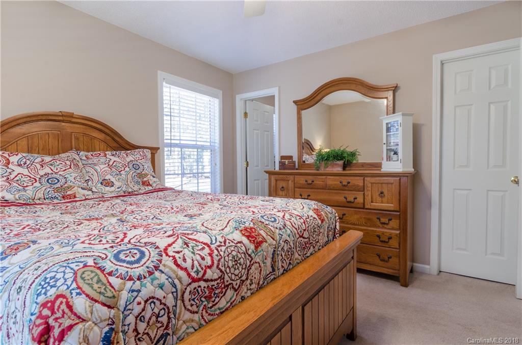 2110 State Rd S-46-168, Unit 25 York, SC 29745 - Photo 9 of 31 a bedroom with a bed and a dresser