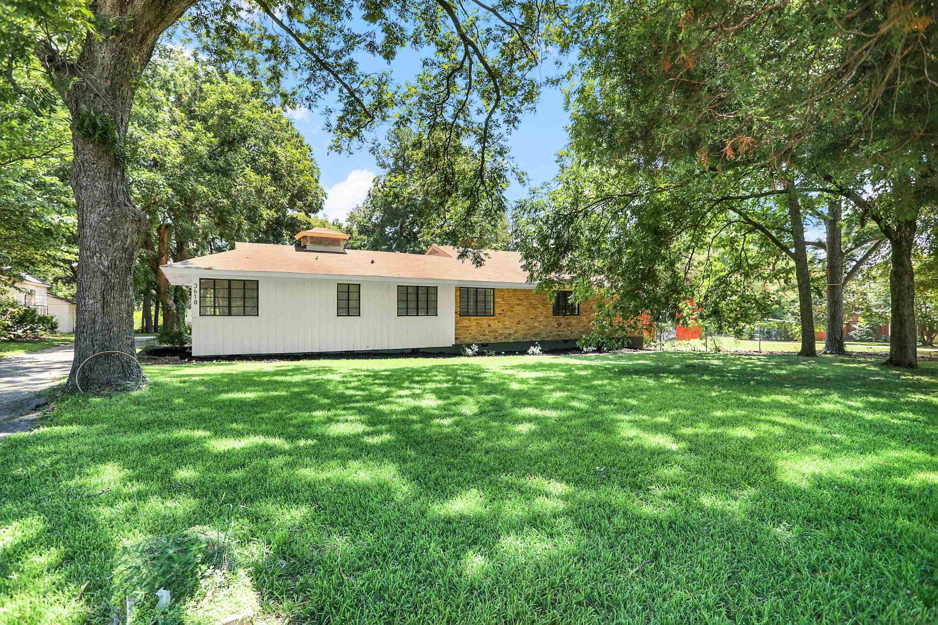 3618 Prescott Road Memphis, TN 38118 - Photo 1 of 20 a view of a house with backyard and garden