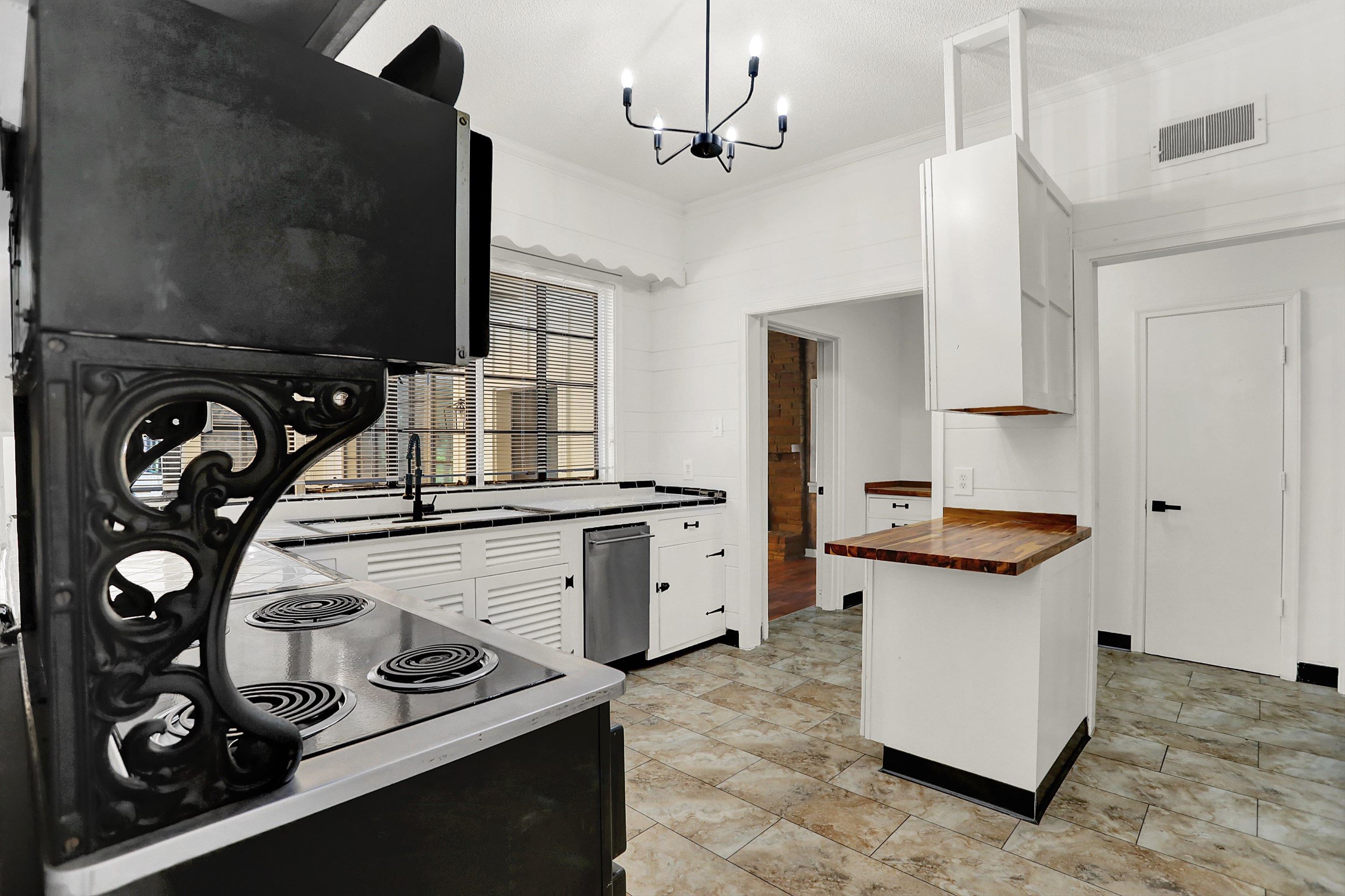 3618 Prescott Road Memphis, TN 38118 - Photo 12 of 20 a kitchen with a stove and a sink