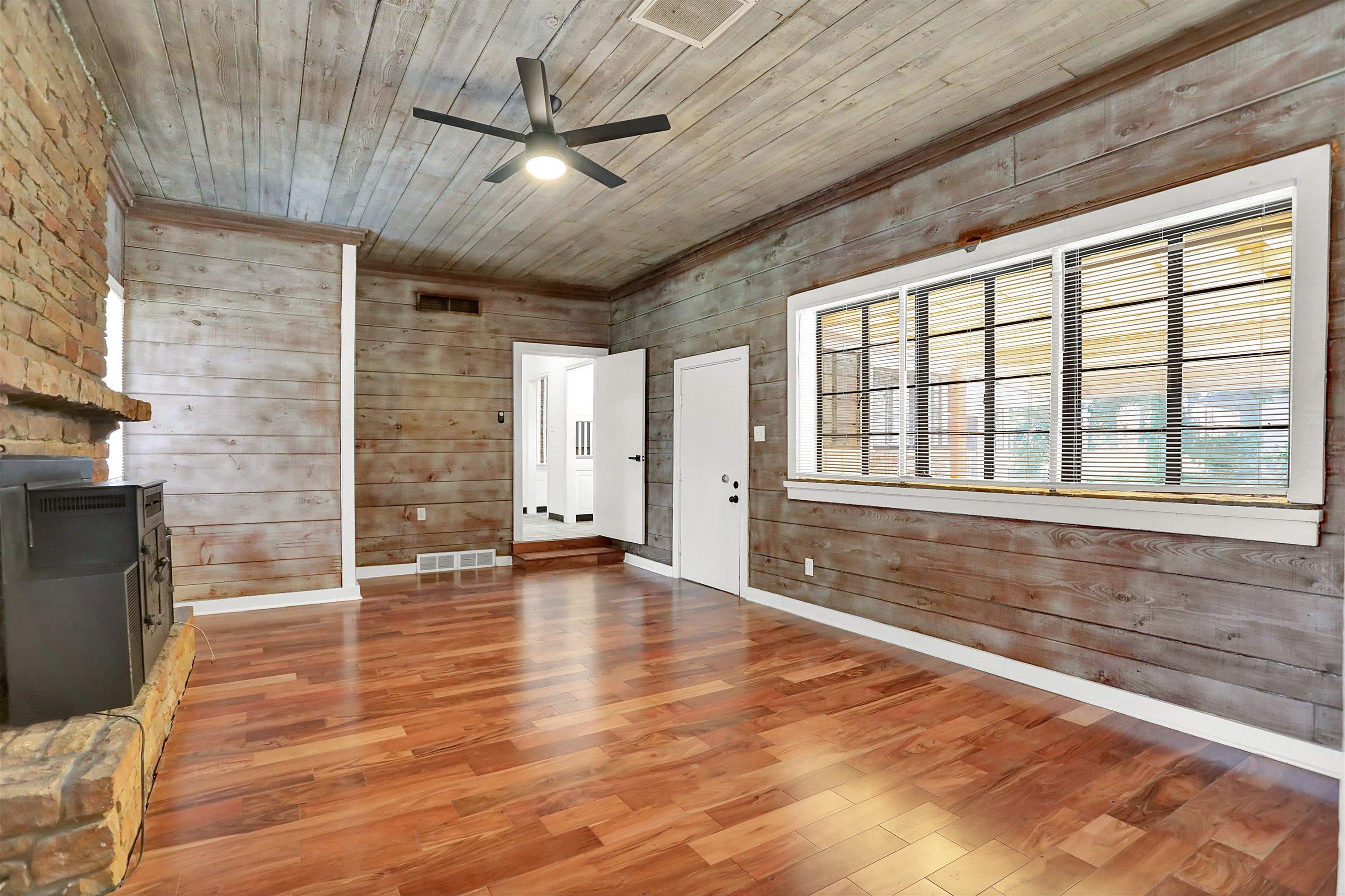 3618 Prescott Road Memphis, TN 38118 - Photo 13 of 20 a view of an empty room with a window and a fireplace