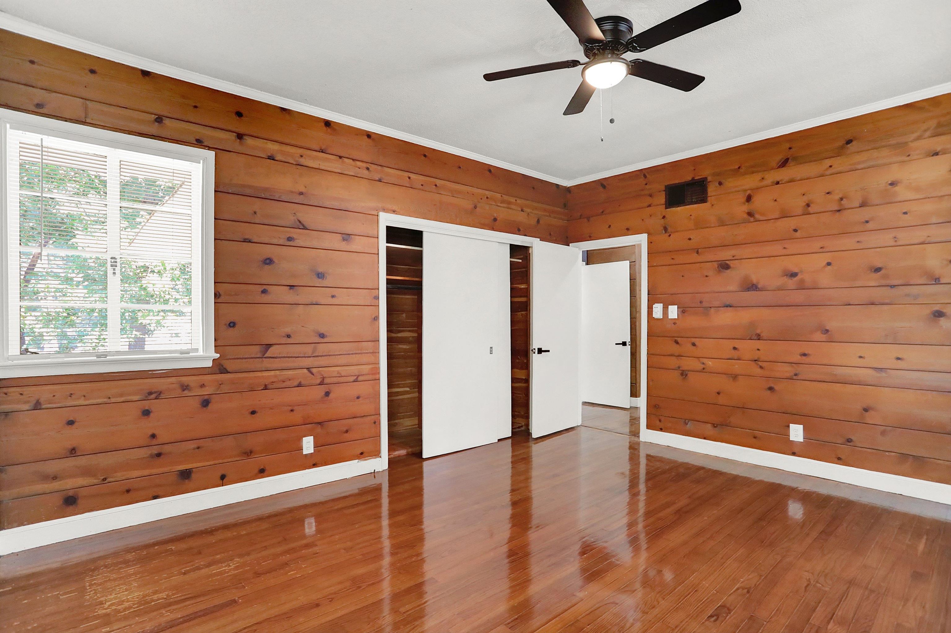 3618 Prescott Road Memphis, TN 38118 - Photo 16 of 20 a view of empty room with wooden floor and fan