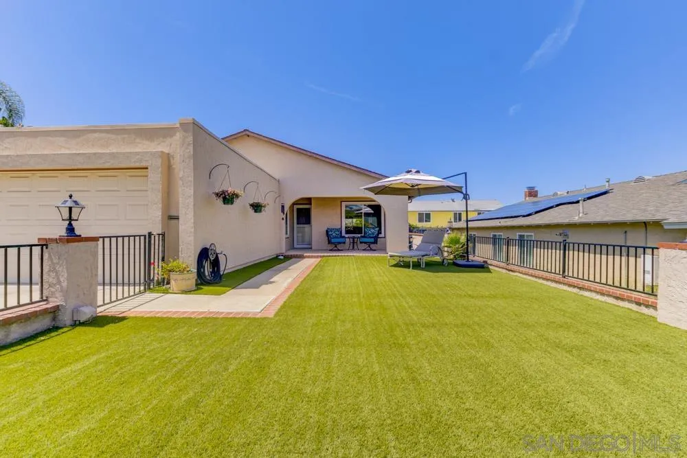 13008 Acton Avenue Poway, CA 92064 - Photo 1 of 28 a front view of house with yard and seating area