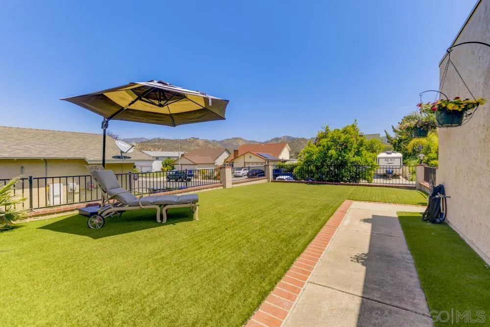 13008 Acton Avenue Poway, CA 92064 - Photo 2 of 28 a view of swimming pool with seating area