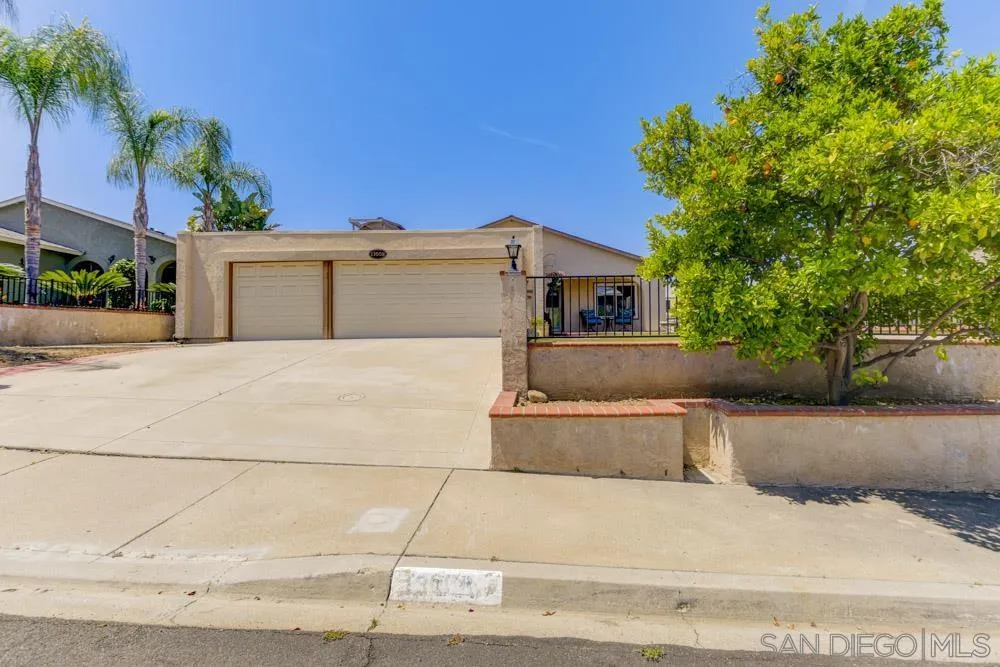 13008 Acton Avenue Poway, CA 92064 - Photo 28 of 28 a front view of a house with a yard