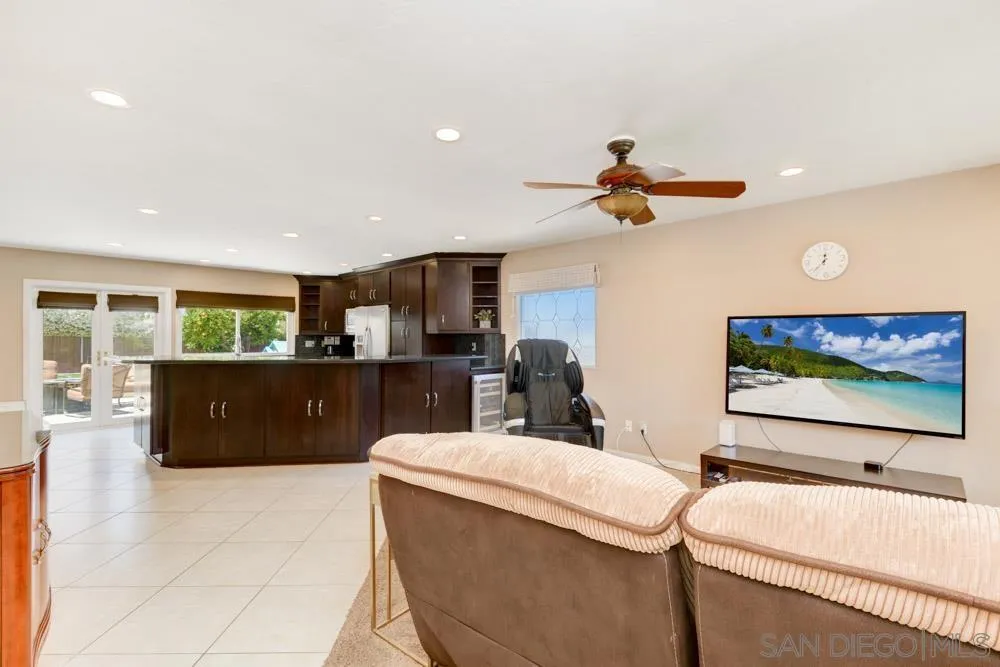 13008 Acton Avenue Poway, CA 92064 - Photo 3 of 28 a living room with furniture and a flat screen tv