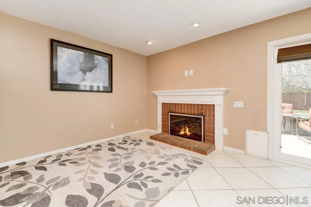 13008 Acton Avenue Poway, CA 92064 - Photo 7 of 28 a view of a livingroom with a fireplace