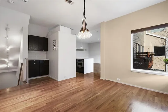 a view of a living room with a flat screen tv