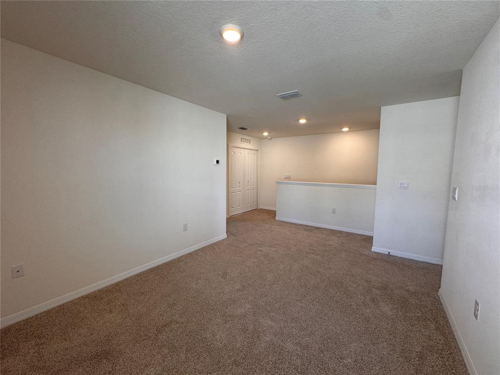 2095 King Ranch Street Kissimmee, FL 34744 - Photo 9 of 17 a view of an empty room