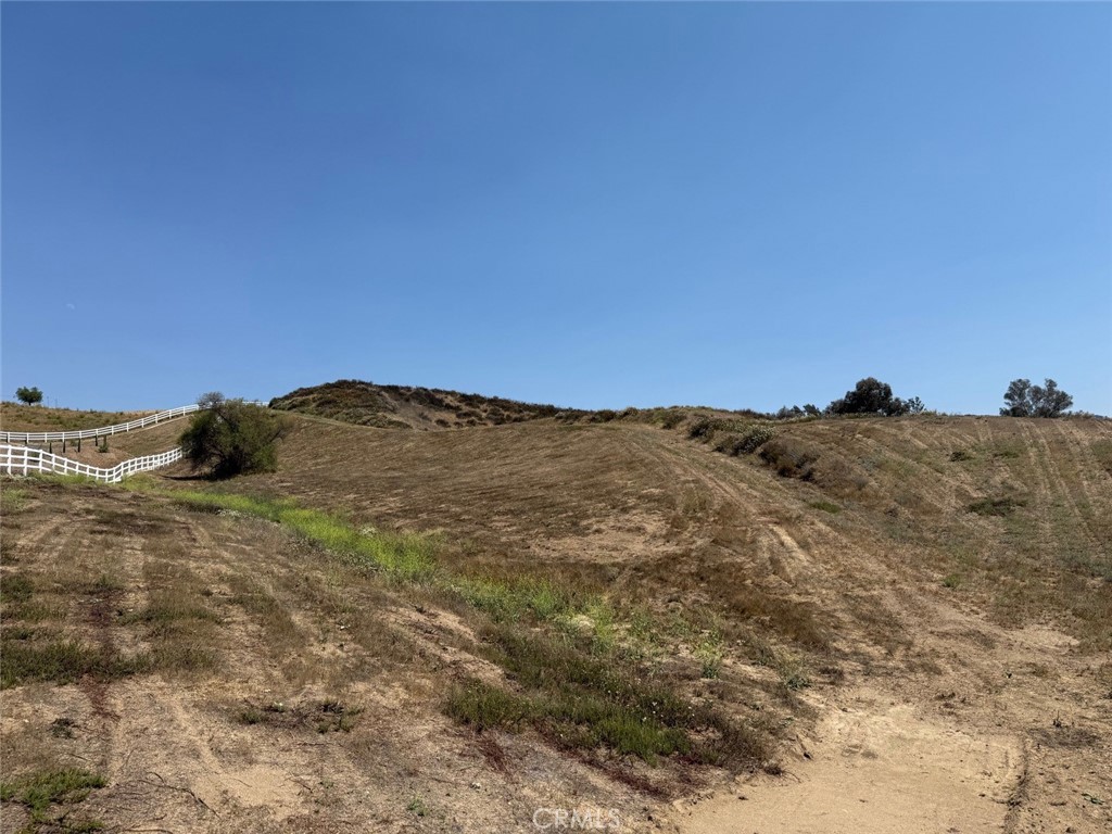 0 Paulita Road Temecula, CA 92592 - Photo 33 of 36 a view of a large building with mountains in the background