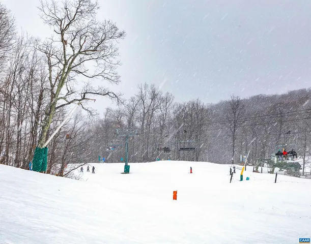 a view of snow on the road