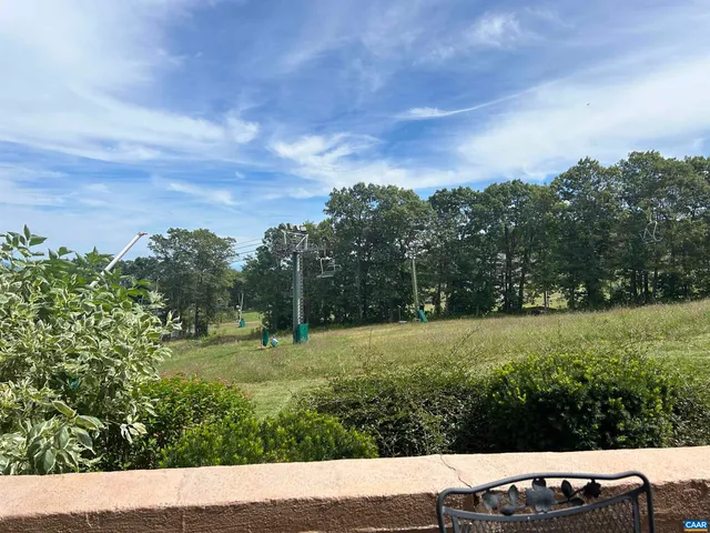 a view of a street with an ocean view