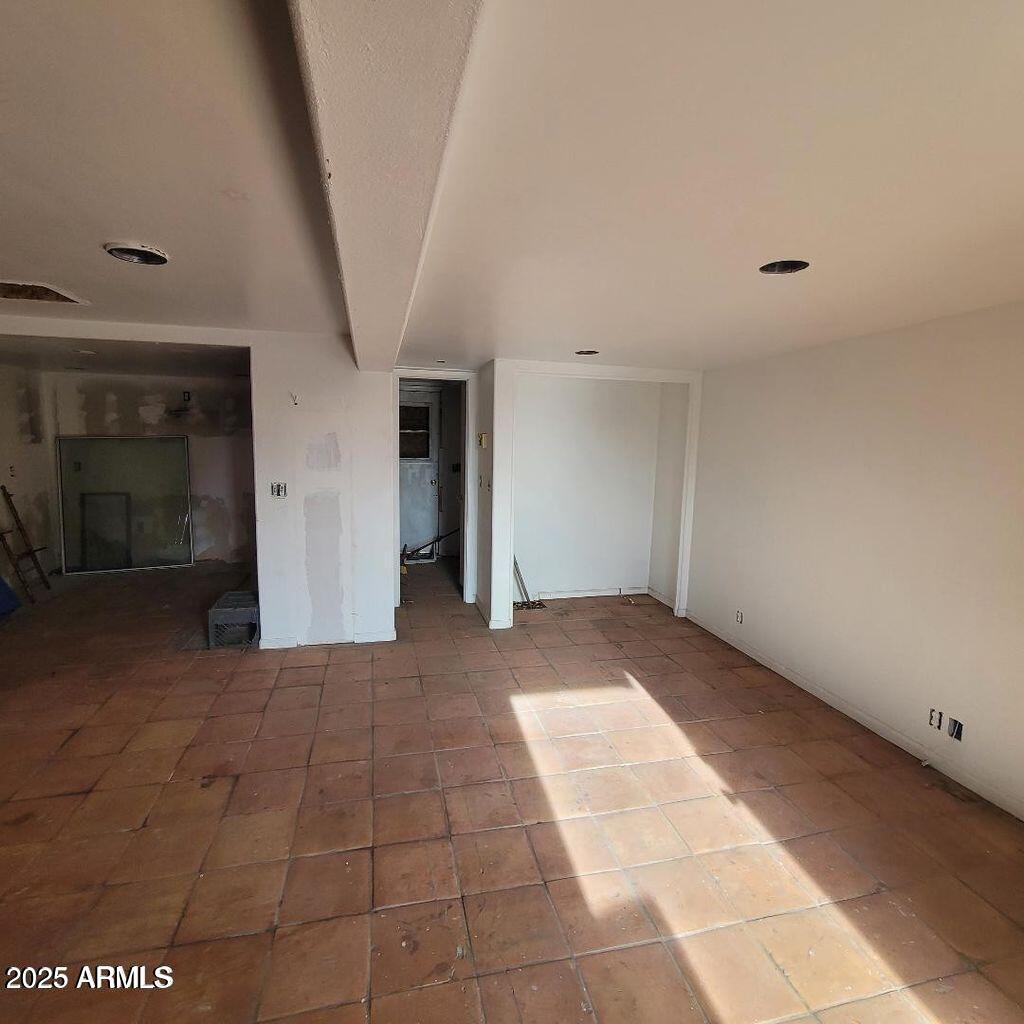 1916 North 22nd Street Phoenix, AZ 85006 - Photo 7 of 15 a view of an empty room with a fireplace