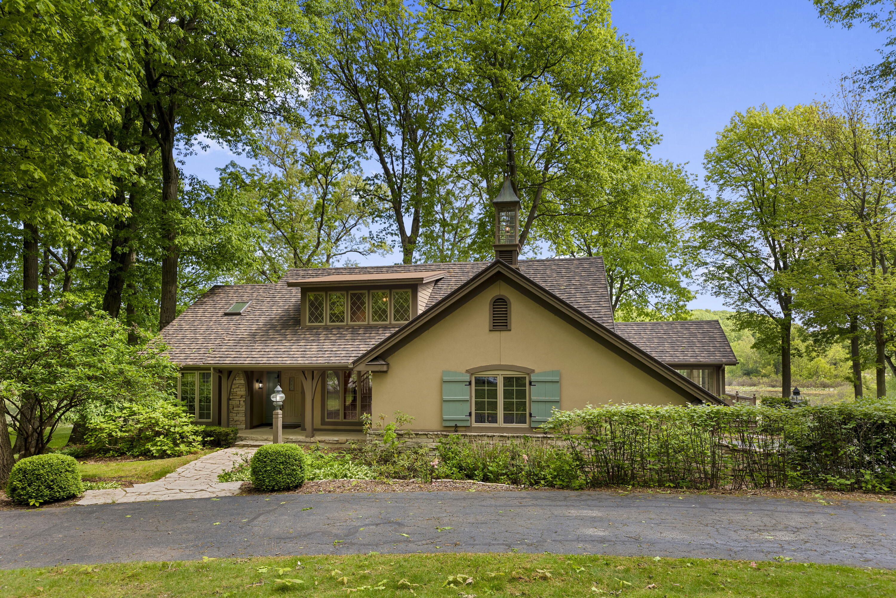3611 West Waverly Road La Porte, IN 46350 - Photo 2 of 40 a front view of a house with a garden
