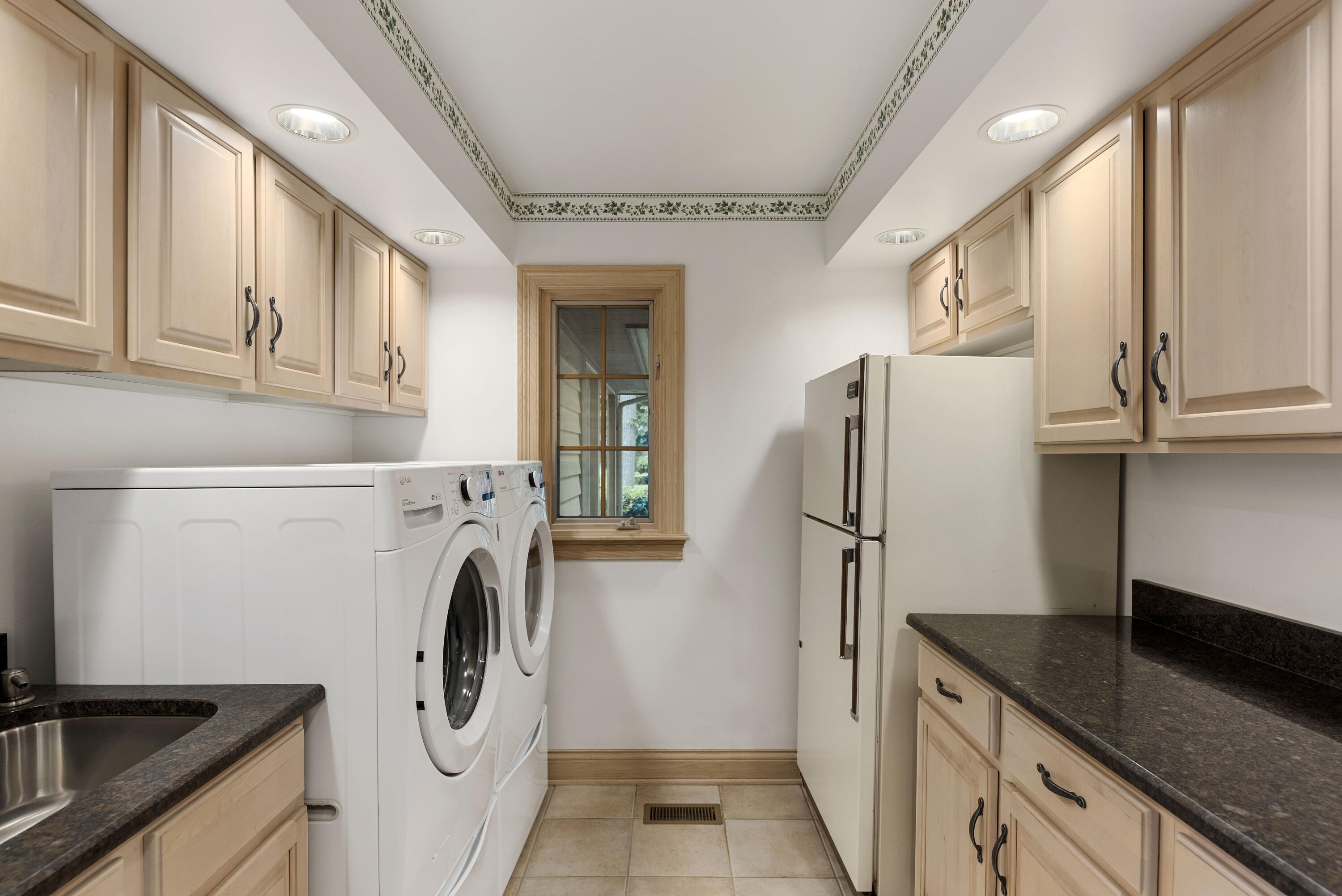 3611 West Waverly Road La Porte, IN 46350 - Photo 21 of 40 a kitchen with stainless steel appliances granite countertop a refrigerator and a sink