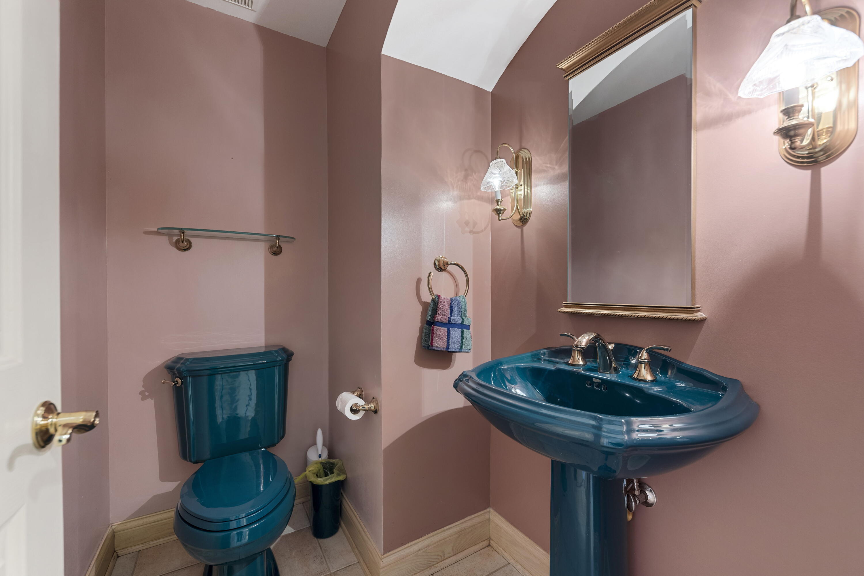 3611 West Waverly Road La Porte, IN 46350 - Photo 22 of 40 a bathroom with a sink a toilet and a mirror