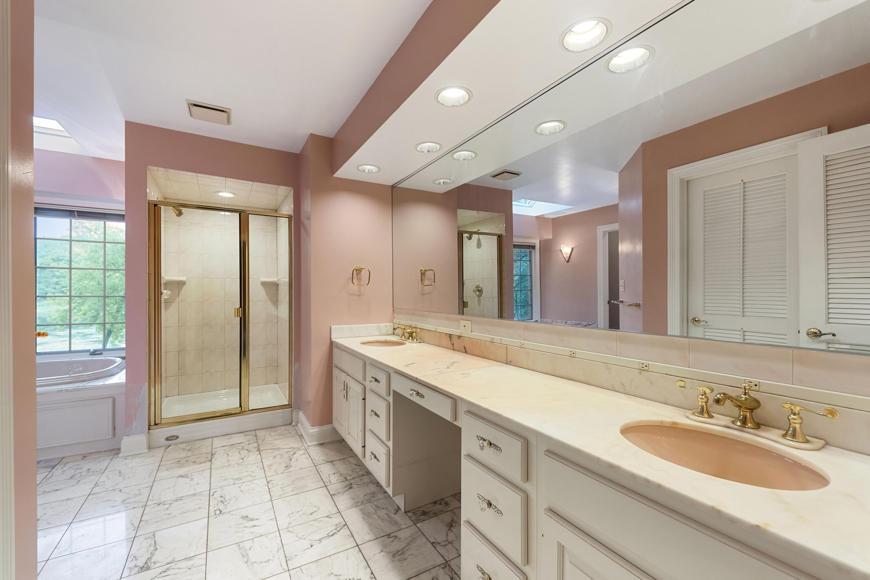 3611 West Waverly Road La Porte, IN 46350 - Photo 25 of 40 a spacious bathroom with a granite countertop sink and a mirror