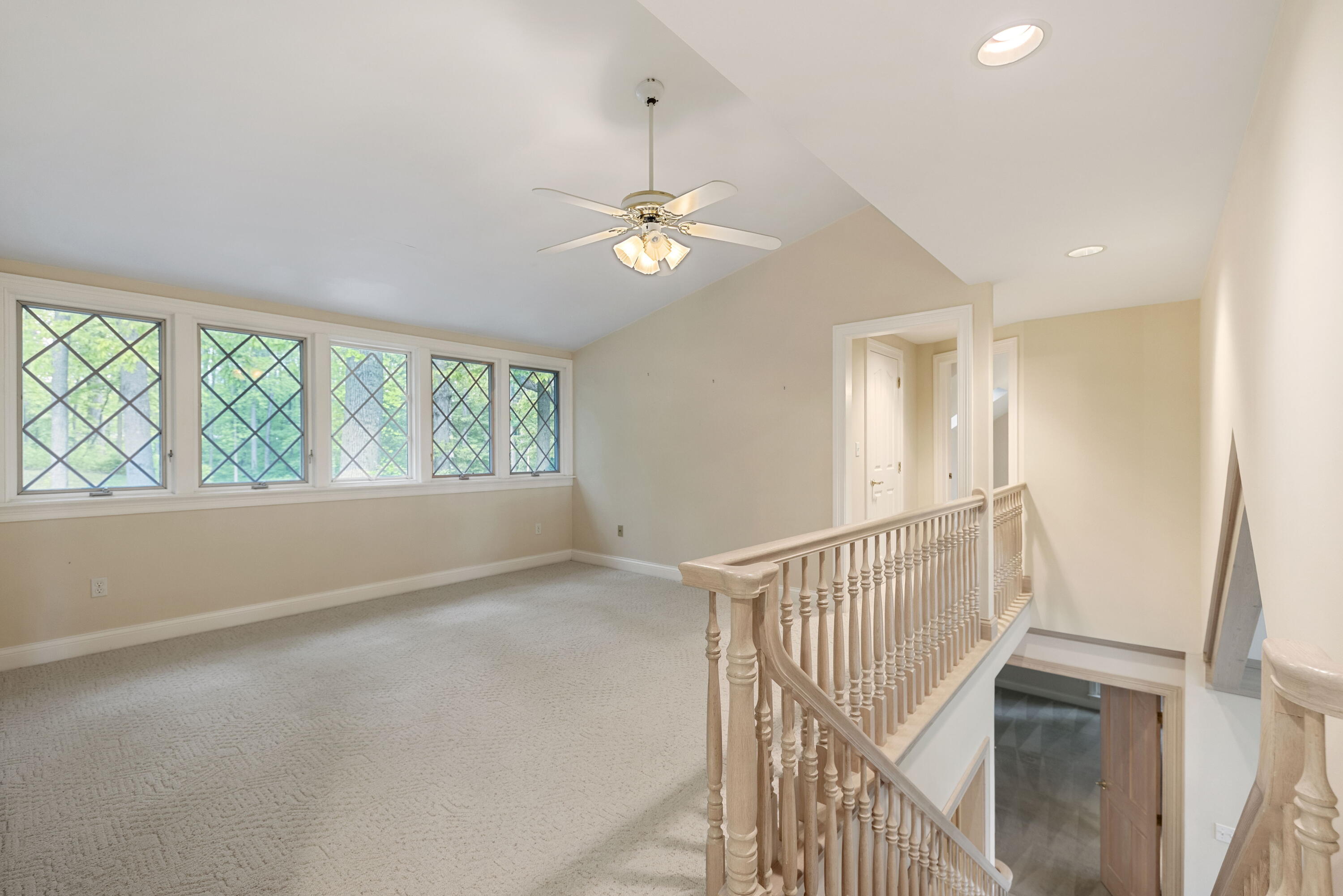 3611 West Waverly Road La Porte, IN 46350 - Photo 27 of 40 an empty room with windows and ceiling fan