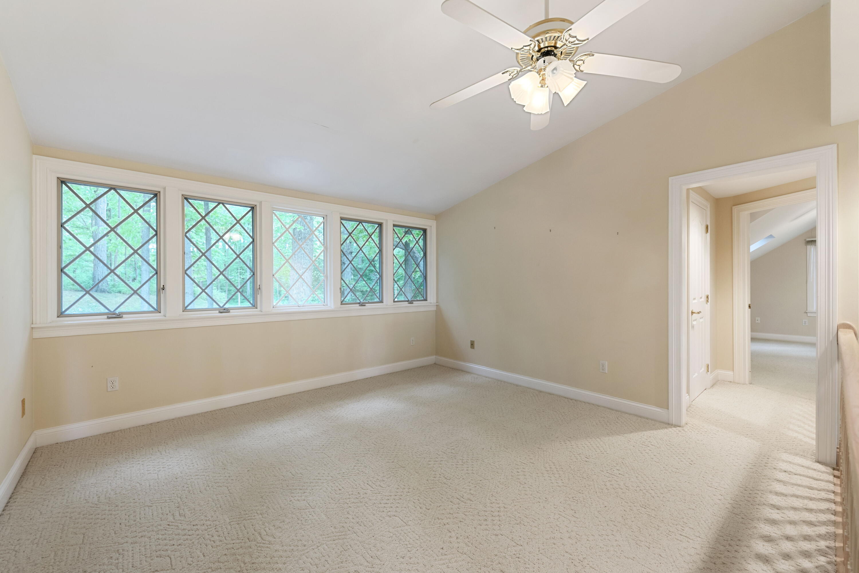 3611 West Waverly Road La Porte, IN 46350 - Photo 29 of 40 an empty room with a window and a fan