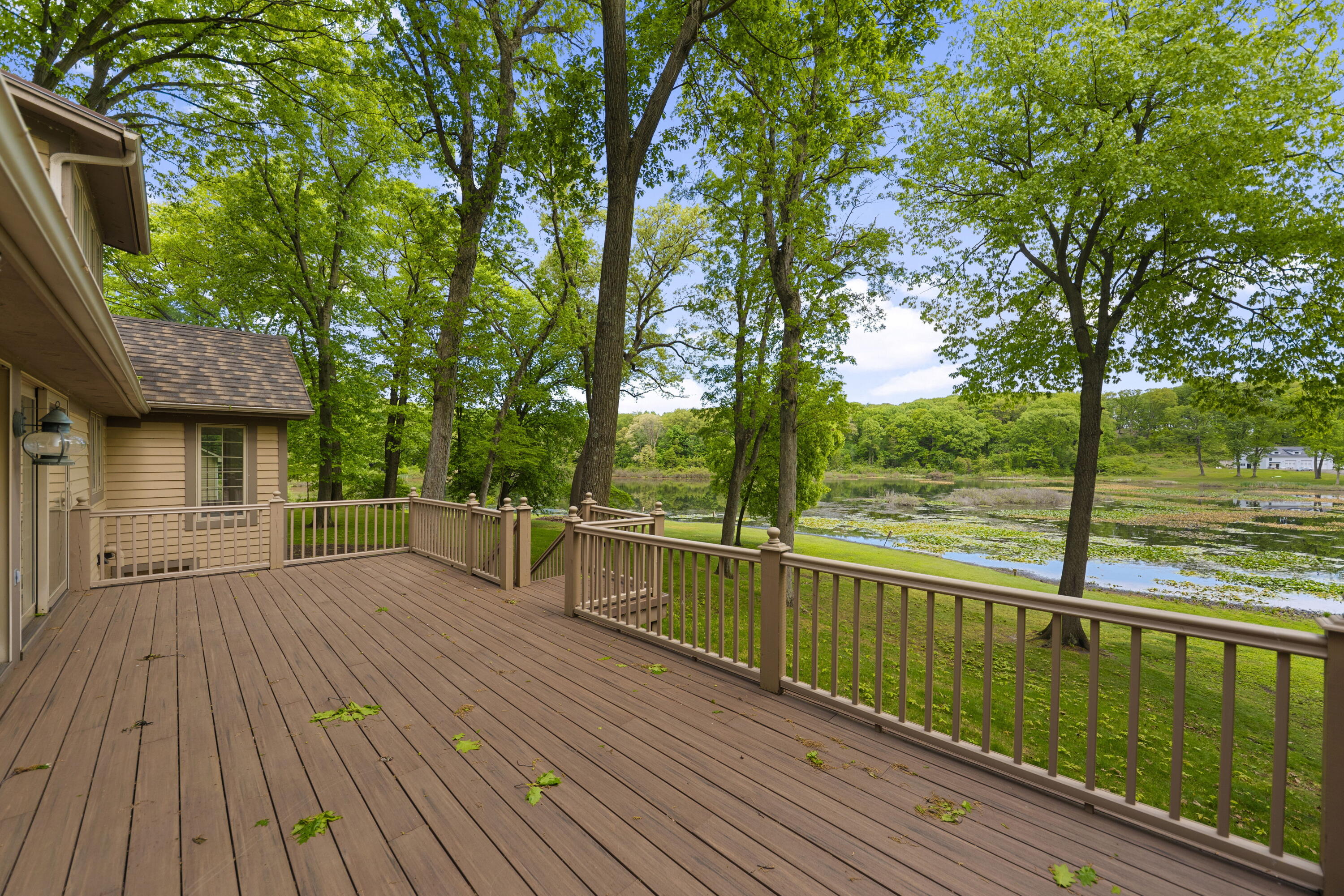 3611 West Waverly Road La Porte, IN 46350 - Photo 39 of 40 a view of a deck with chairs next to a yard