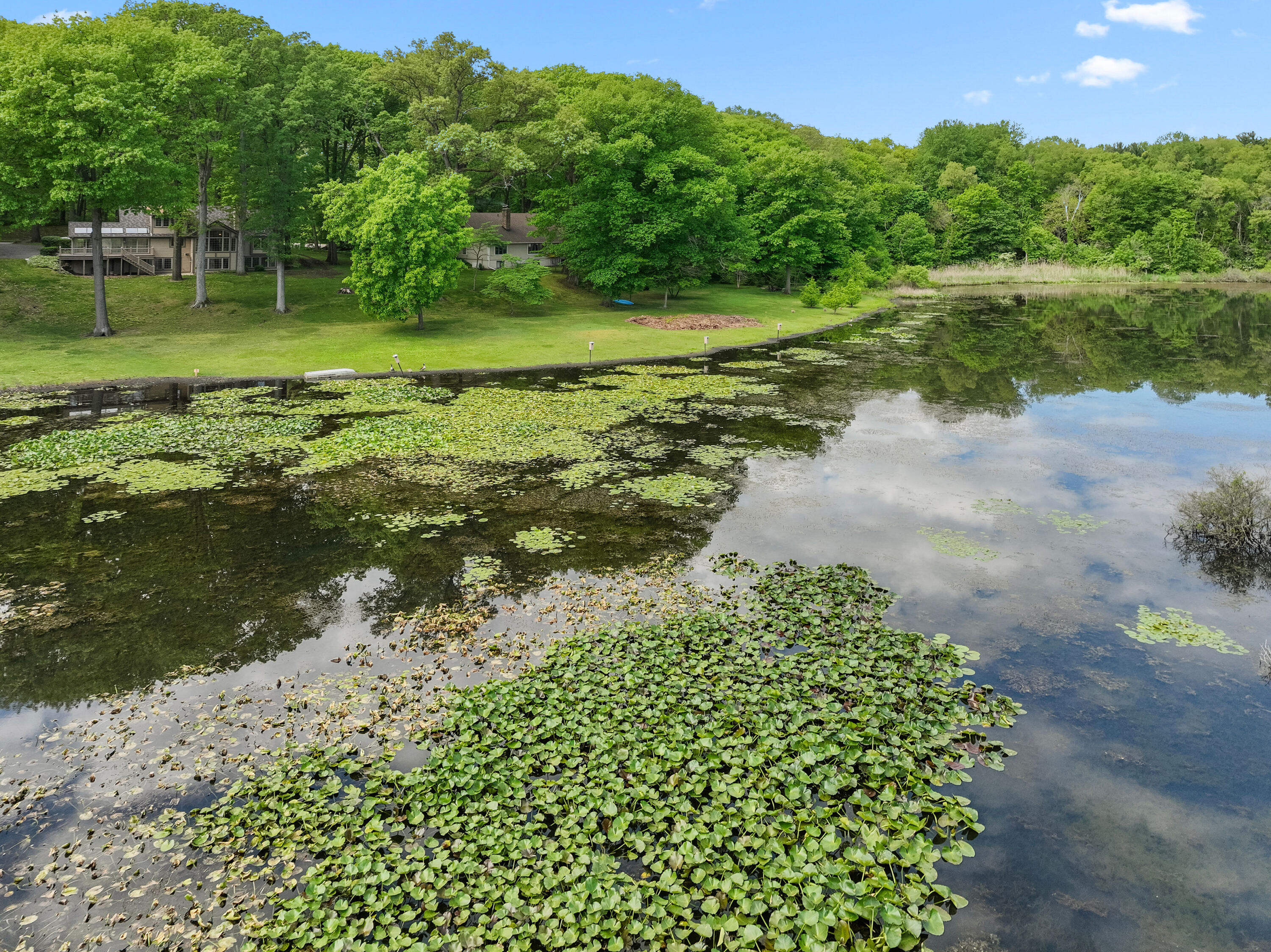 3611 West Waverly Road La Porte, IN 46350 - Photo 5 of 40 a view of a lake with a yard