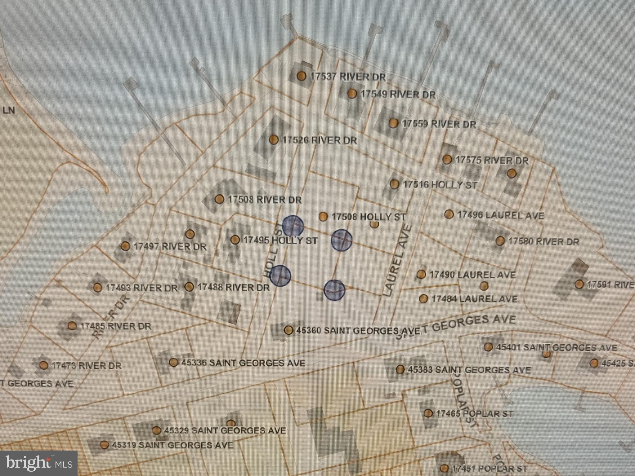 Holly Street Piney Point, MD 20674 - Photo 2 of 2 a large white bed sitting next to a white wall