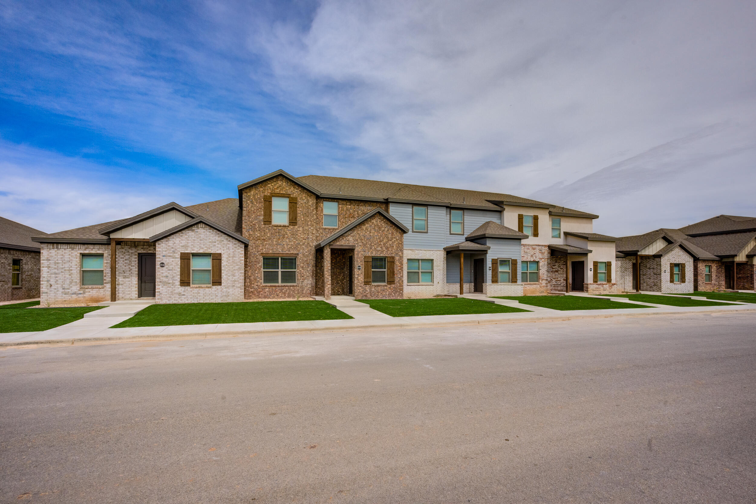 2534 137th Street Lubbock, TX 79423 - Photo 3 of 46 a front view of residential houses with trees
