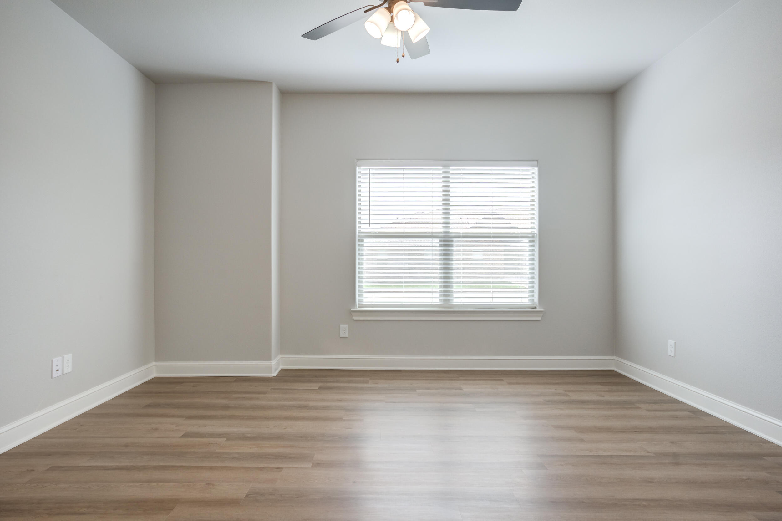 2534 137th Street Lubbock, TX 79423 - Photo 44 of 46 wooden floor in an empty room with a window