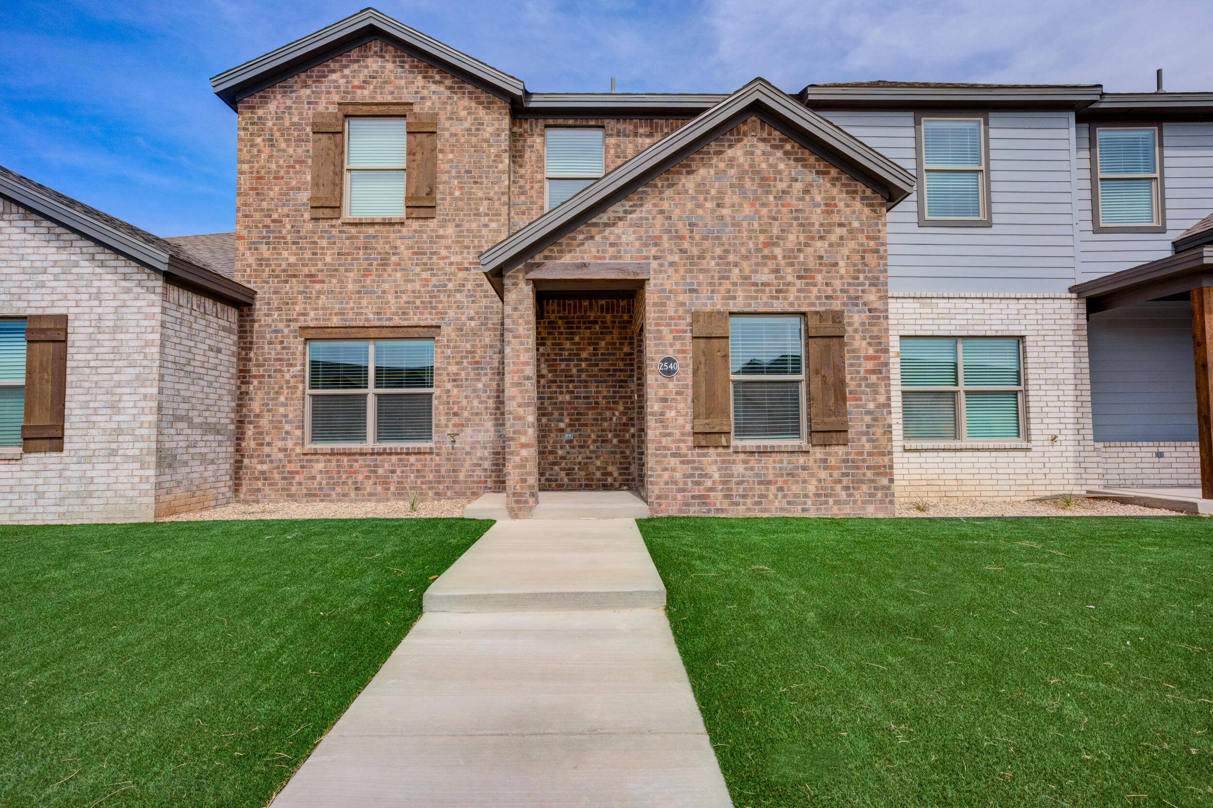 2534 137th Street Lubbock, TX 79423 - Photo 5 of 46 a front view of a house with a yard