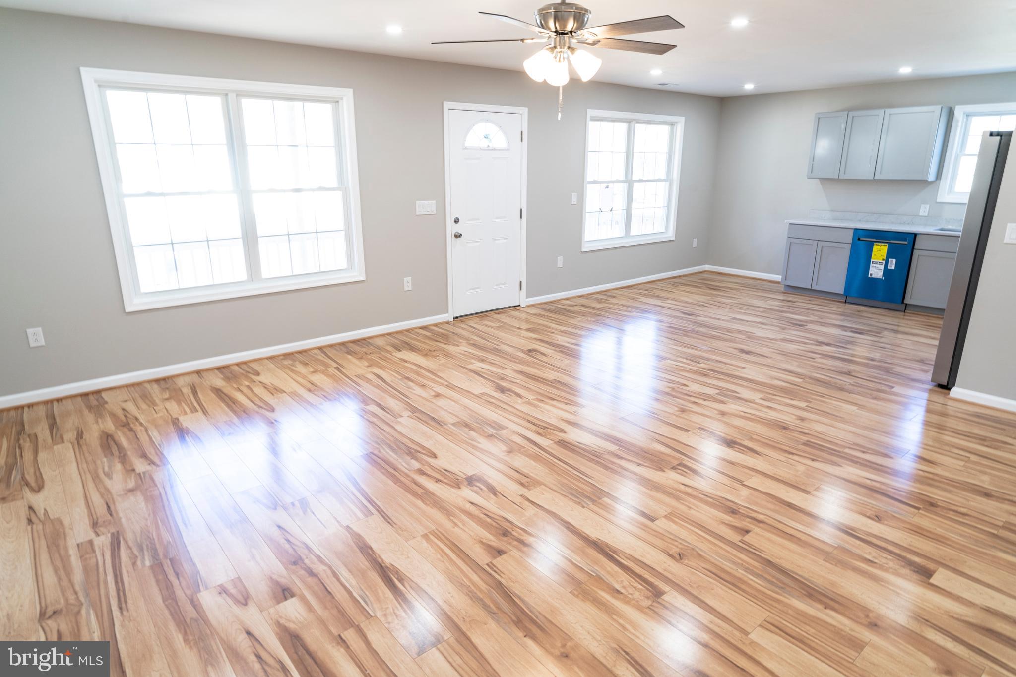 240 Deford Avenue Stanley, VA 22851 - Photo 22 of 60 a view of empty room with wooden floor and fan