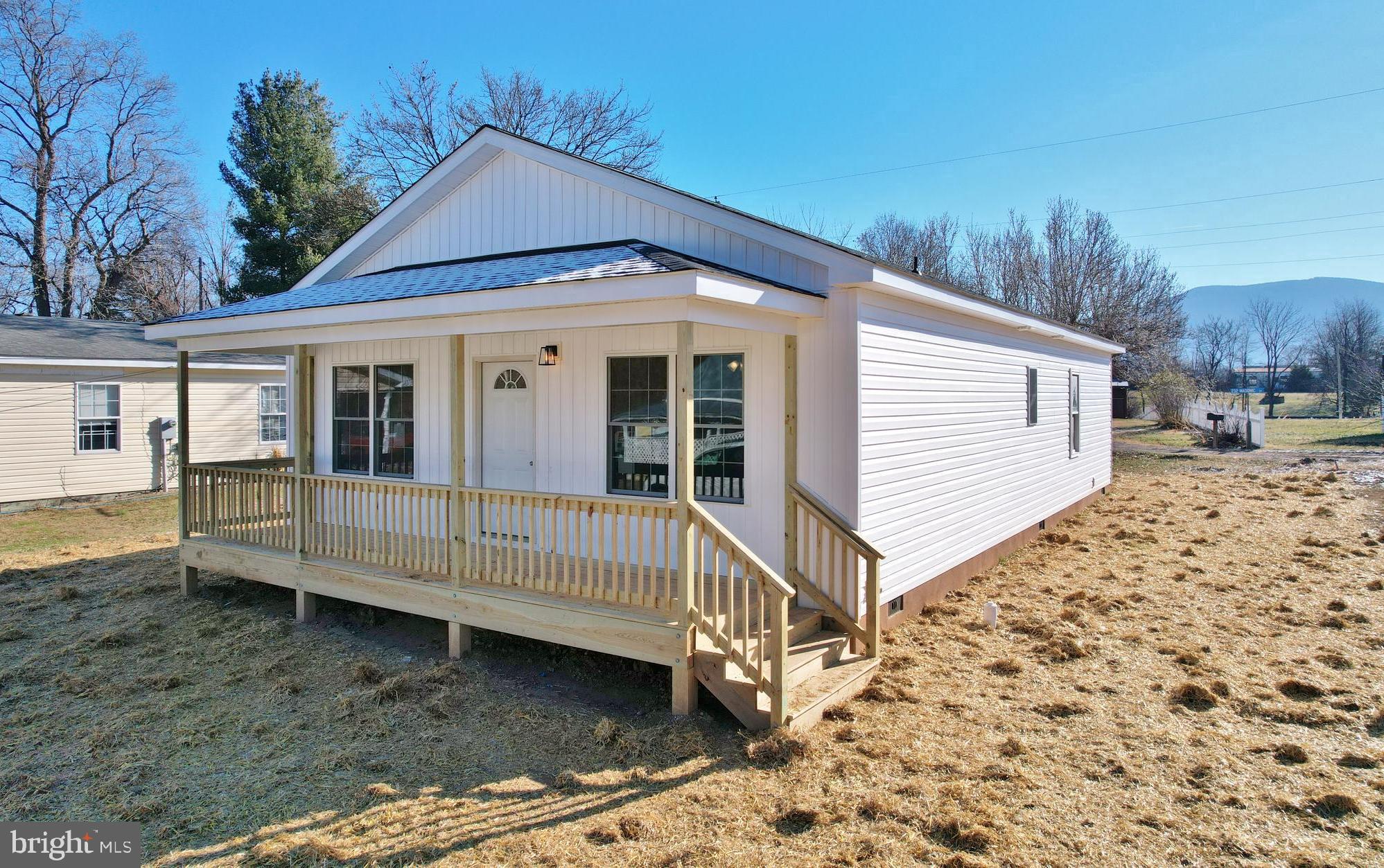 240 Deford Avenue Stanley, VA 22851 - Photo 52 of 60 a view of a house with a yard