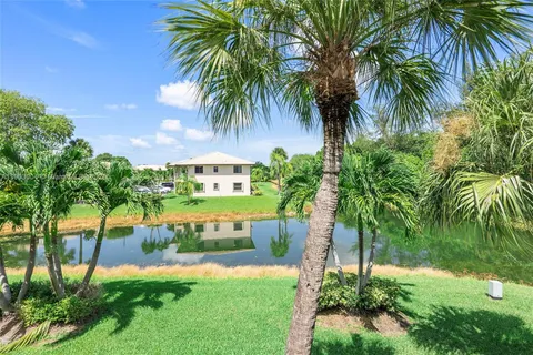 a view of a swimming pool with a garden