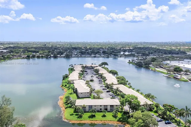 a view of a lake with a city